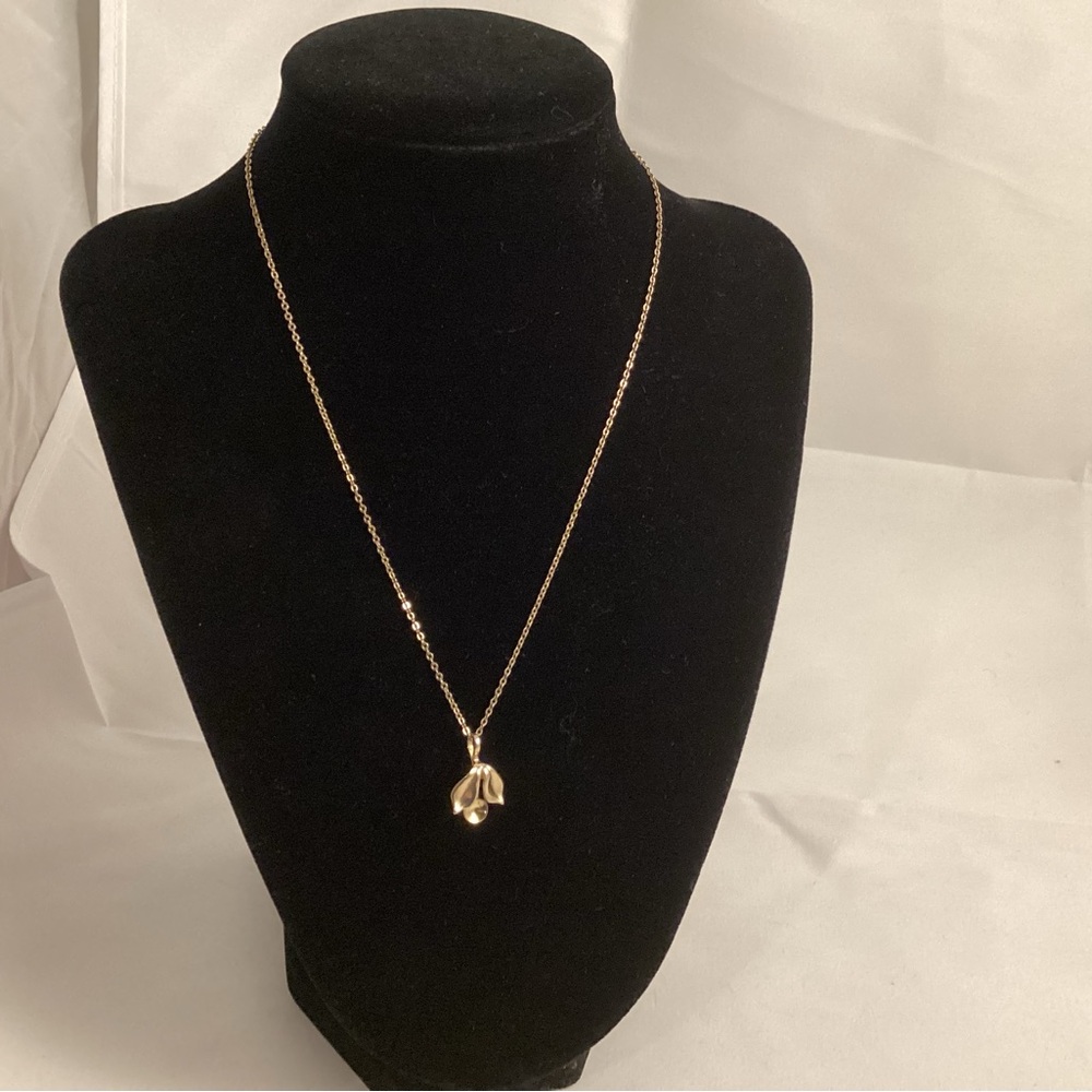 1928 cherry pendant on a gold tone chain